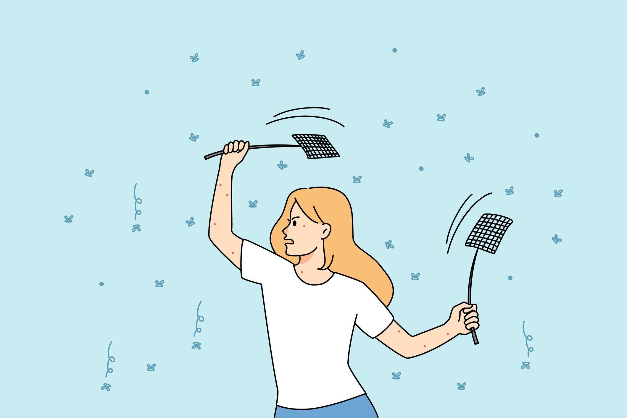 蚊を殺すハエのスワッターを持つ女性