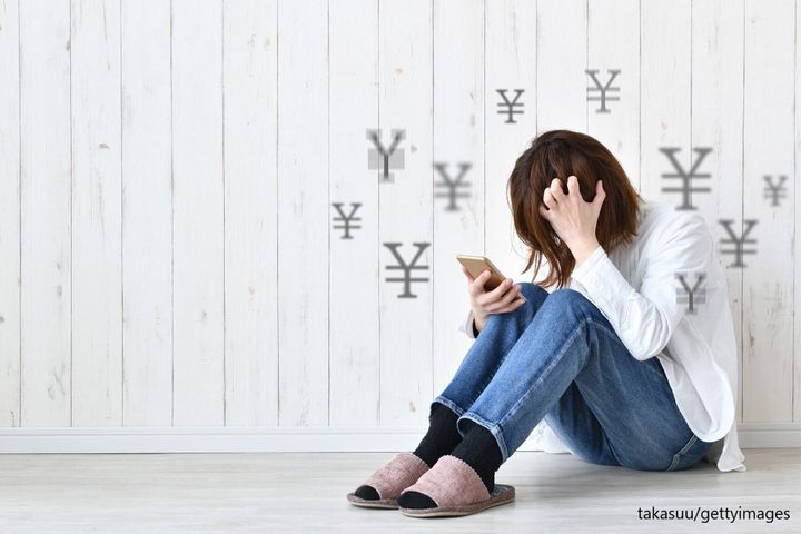 悩む女性