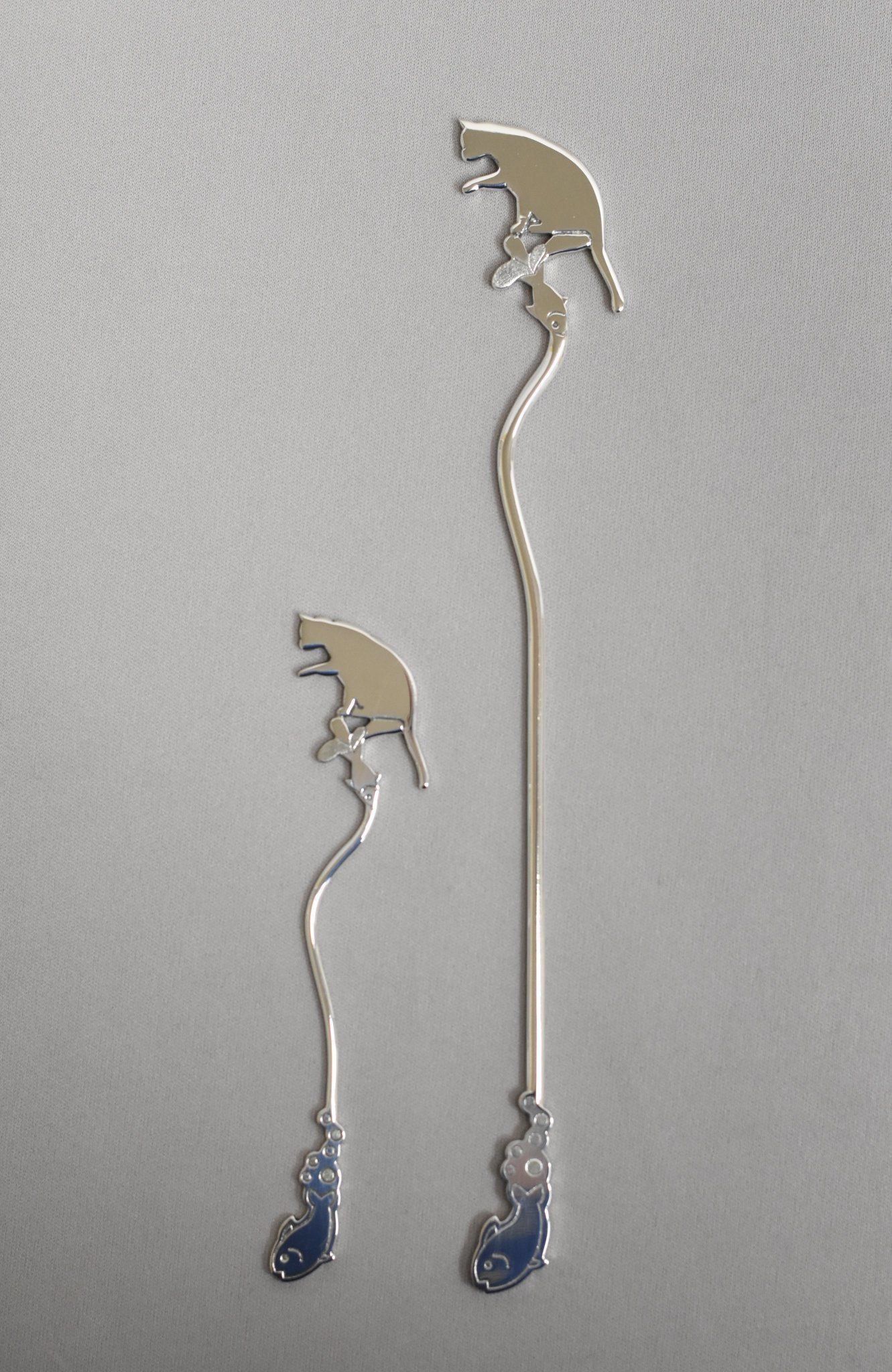 魚と猫の銀製マドラー