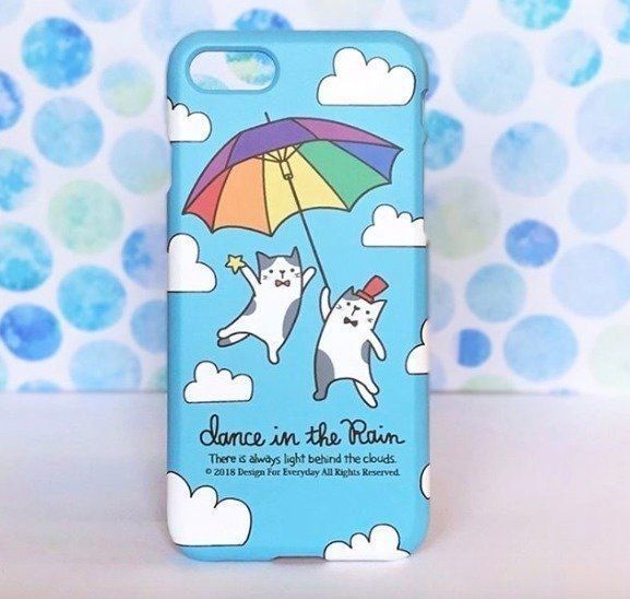 傘さしてる猫イラストの携帯ケース