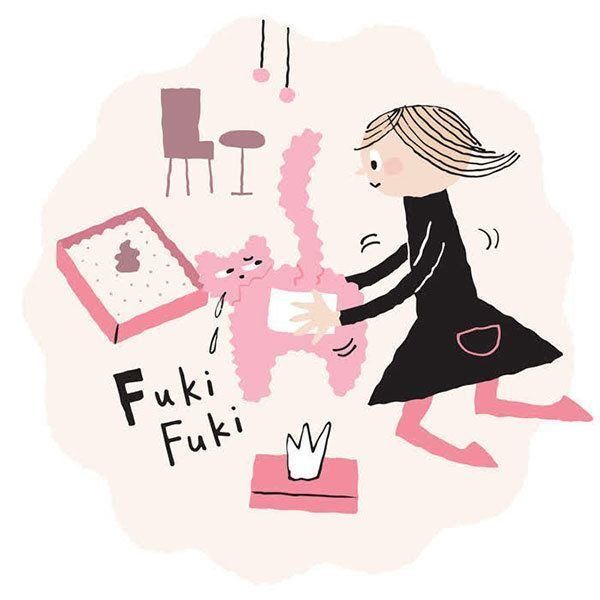 体を拭かれる猫