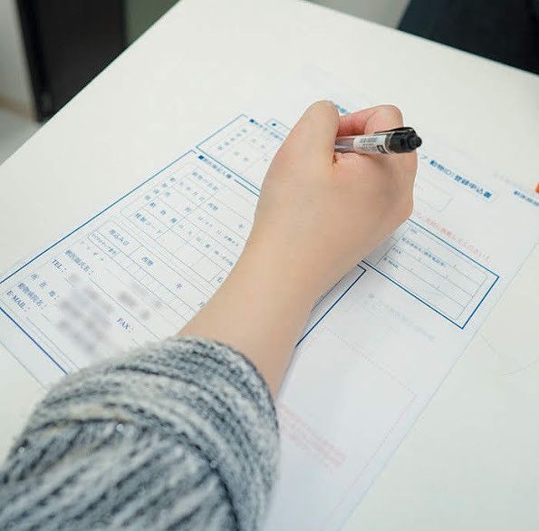 情報登録をする飼い主さん