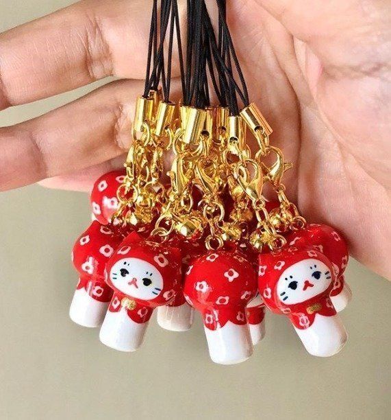 猫こけしのストラップ