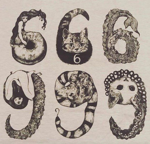 猫と6と9の数字のTシャツ