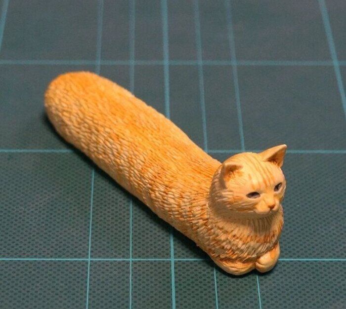 胴がのびた猫
