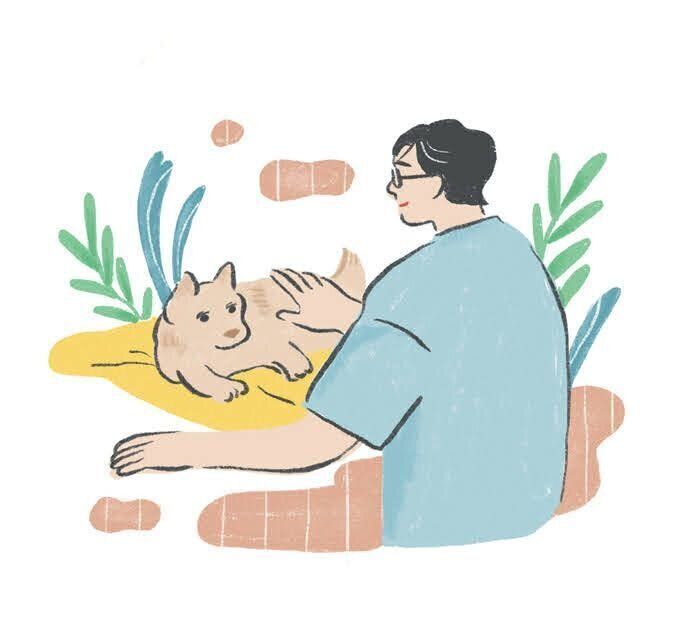 犬をなでる男性