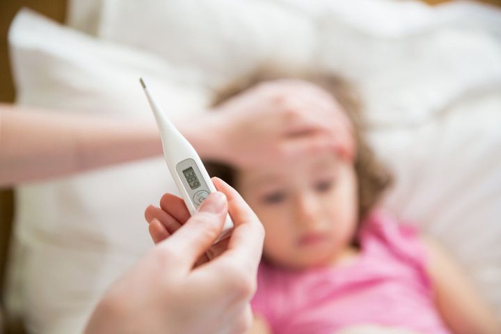 高熱の病気の子供