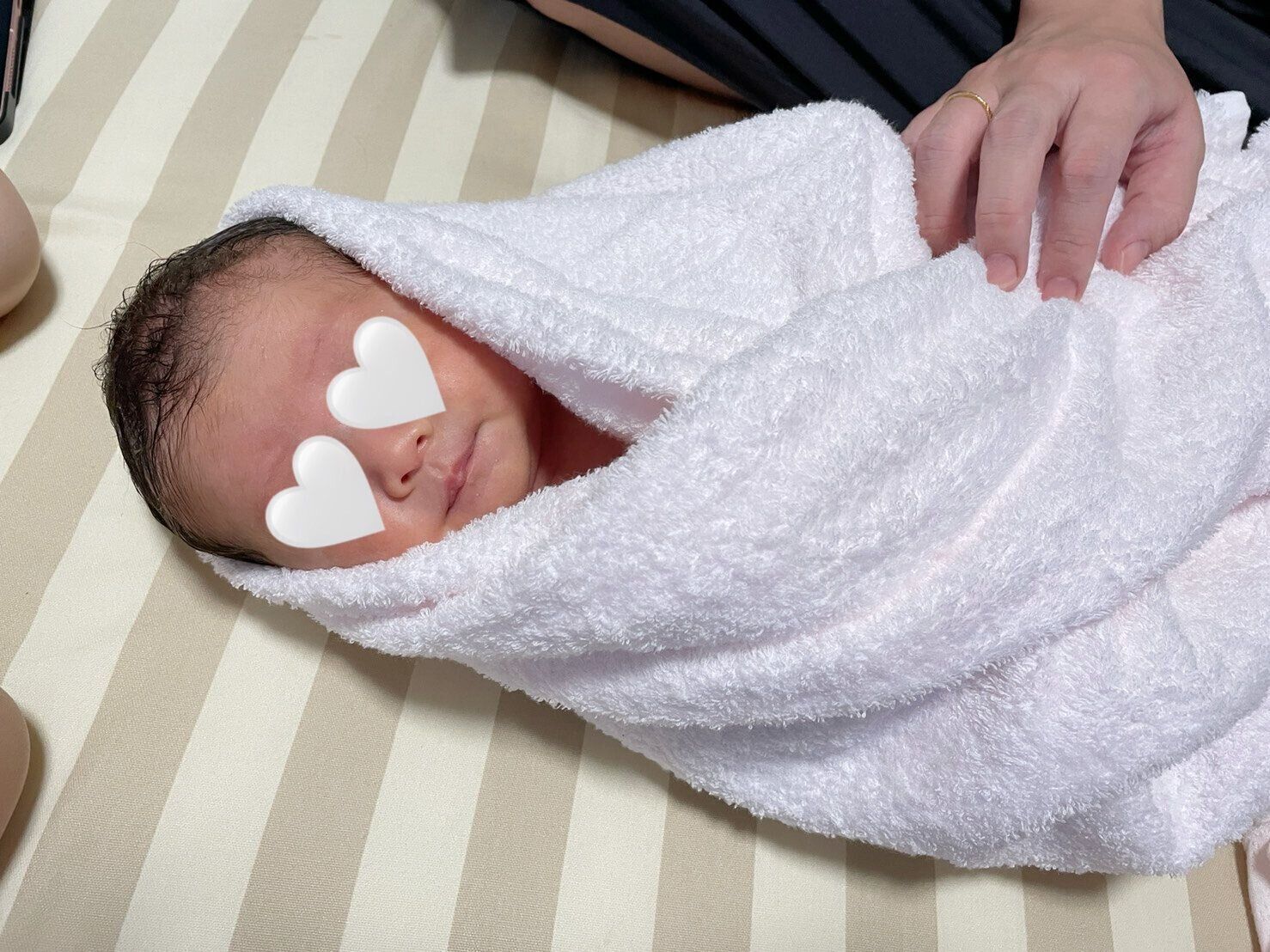 まだ赤ちゃんのころの二女。おふろ上がりの写真。