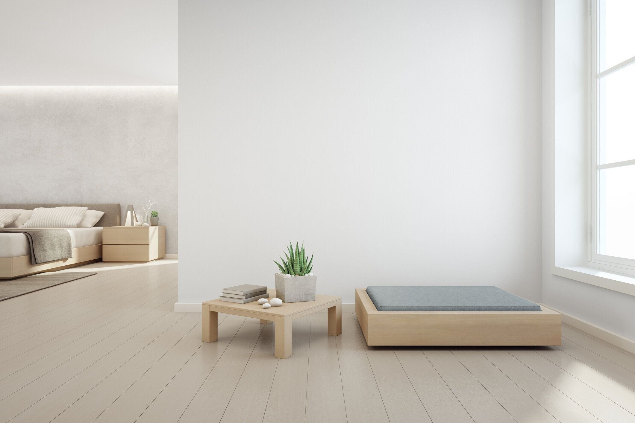 木製のコーヒー テーブルとモダンな家具と空の白いコンクリートの壁の背景、北欧の家のリビング ルームの近くの寝室に観葉植物