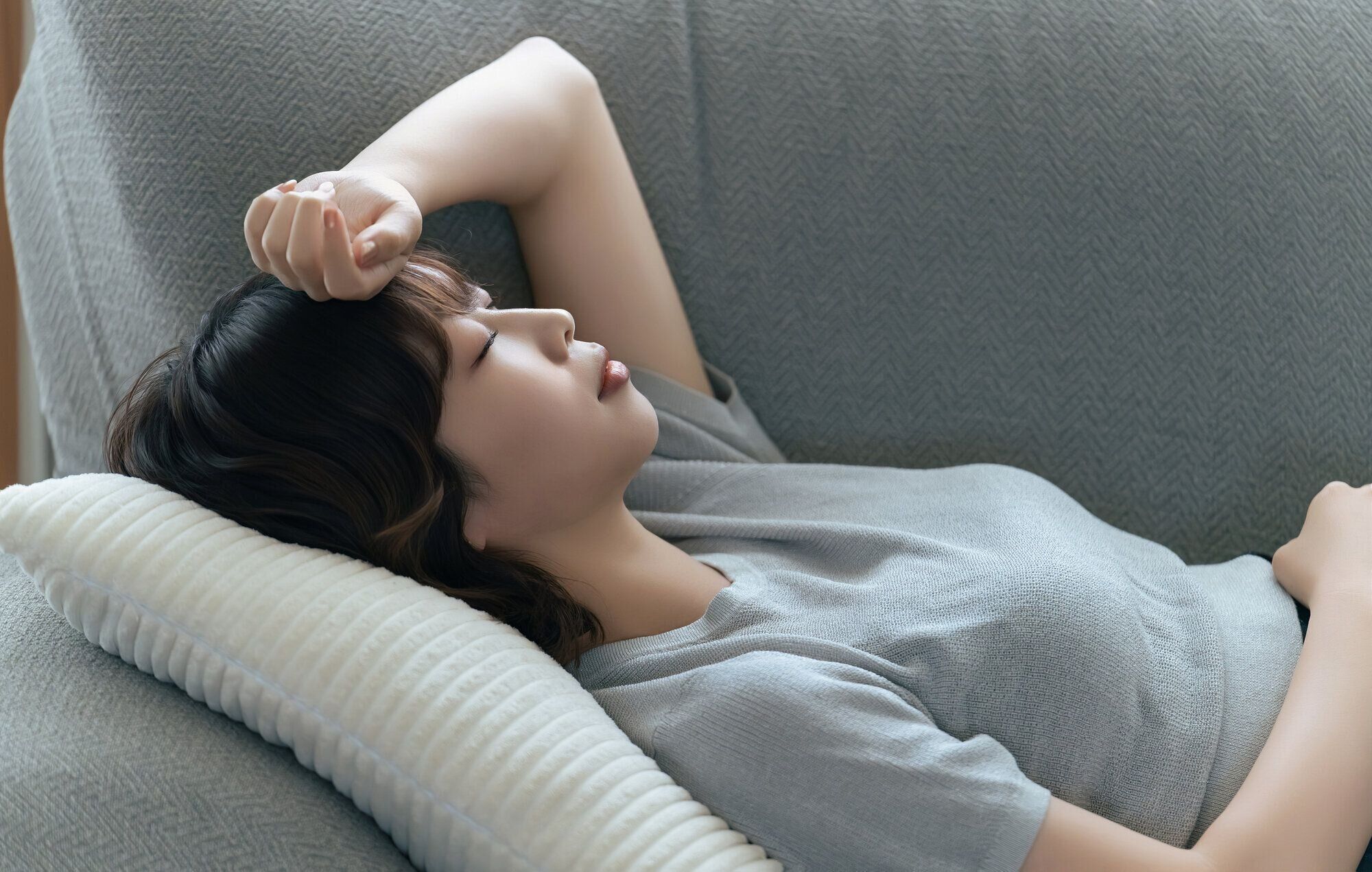妊娠初期の体調不良に悩む女性