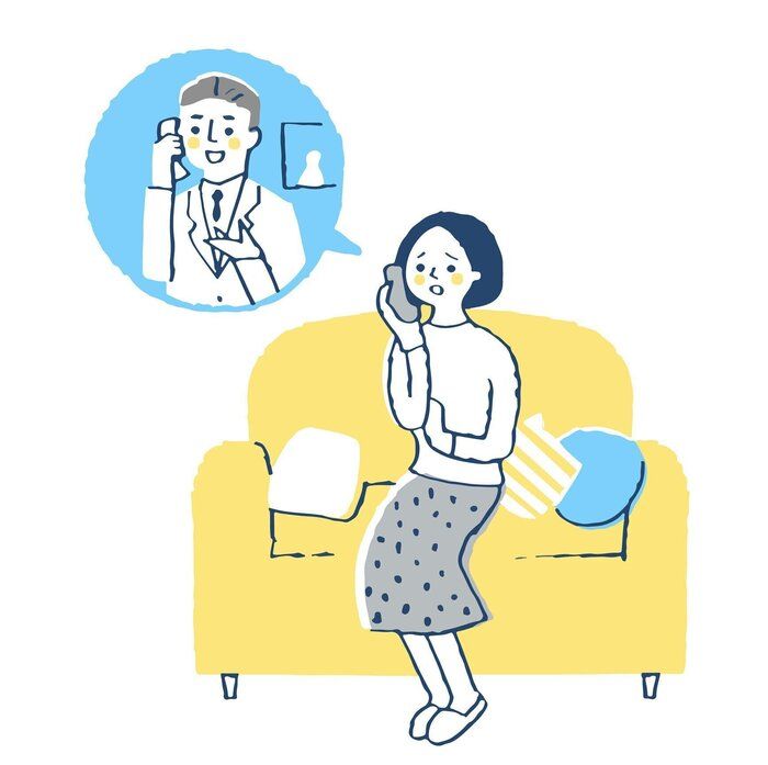 電話で医療機関に相談する女性