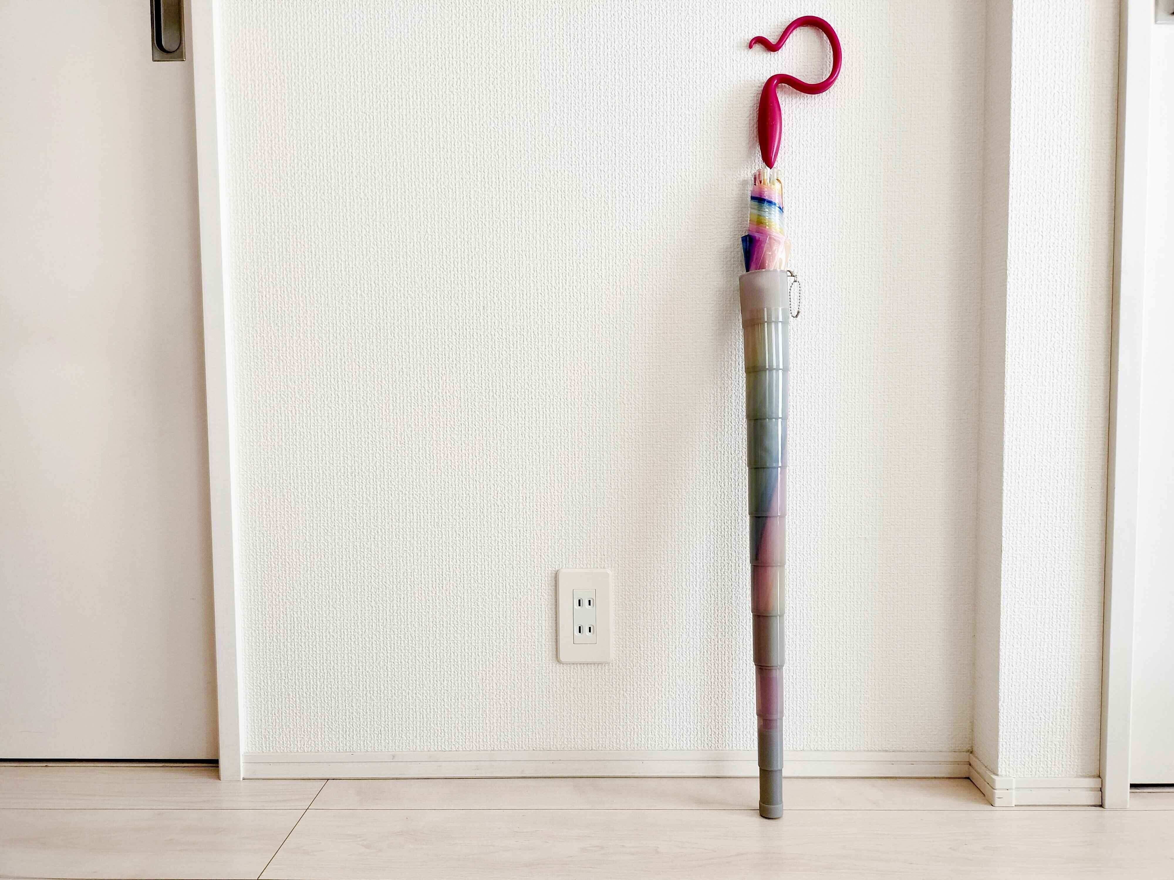 伸縮傘カバーを付けた長傘