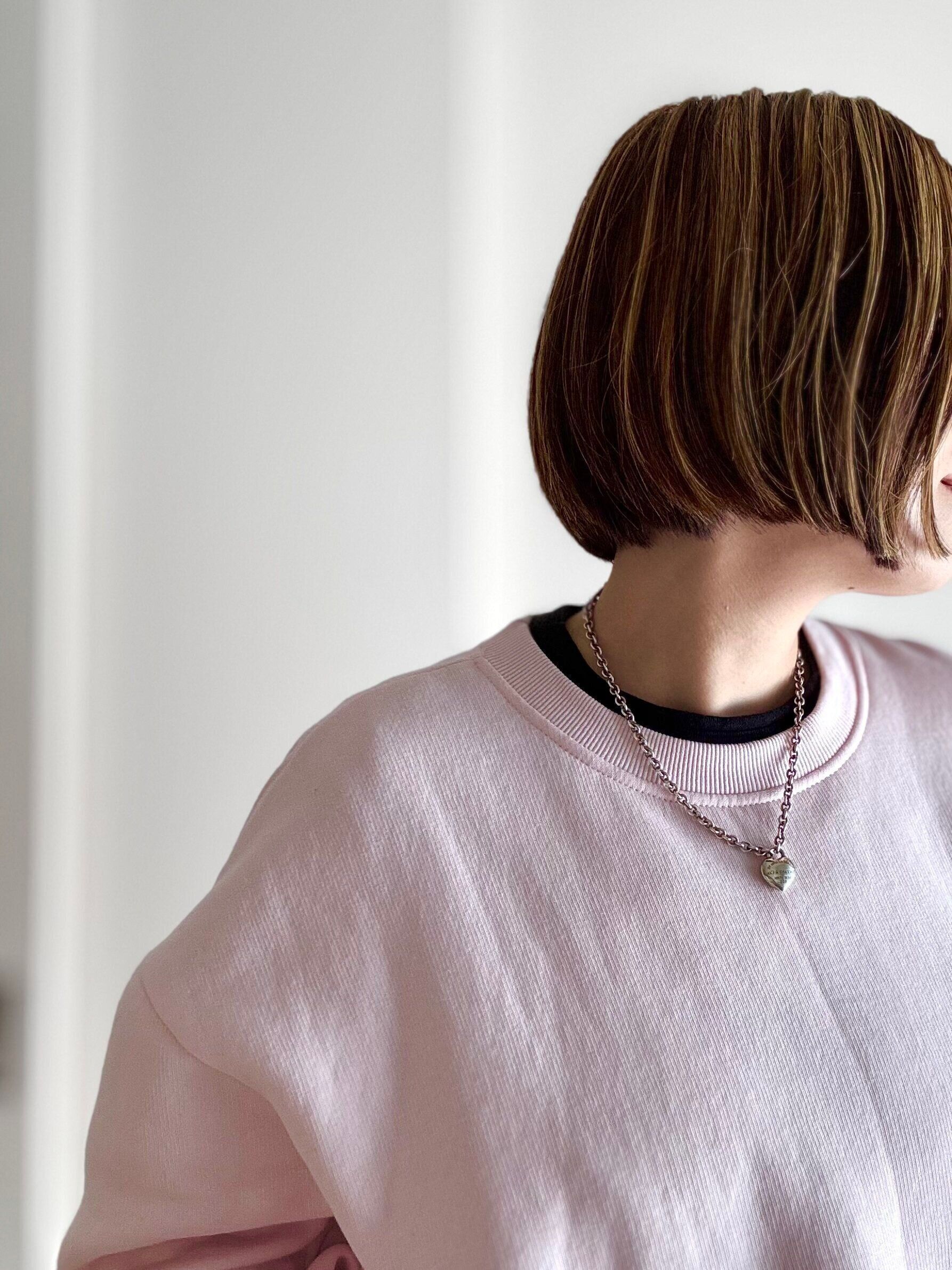 ピンクのトレーナー