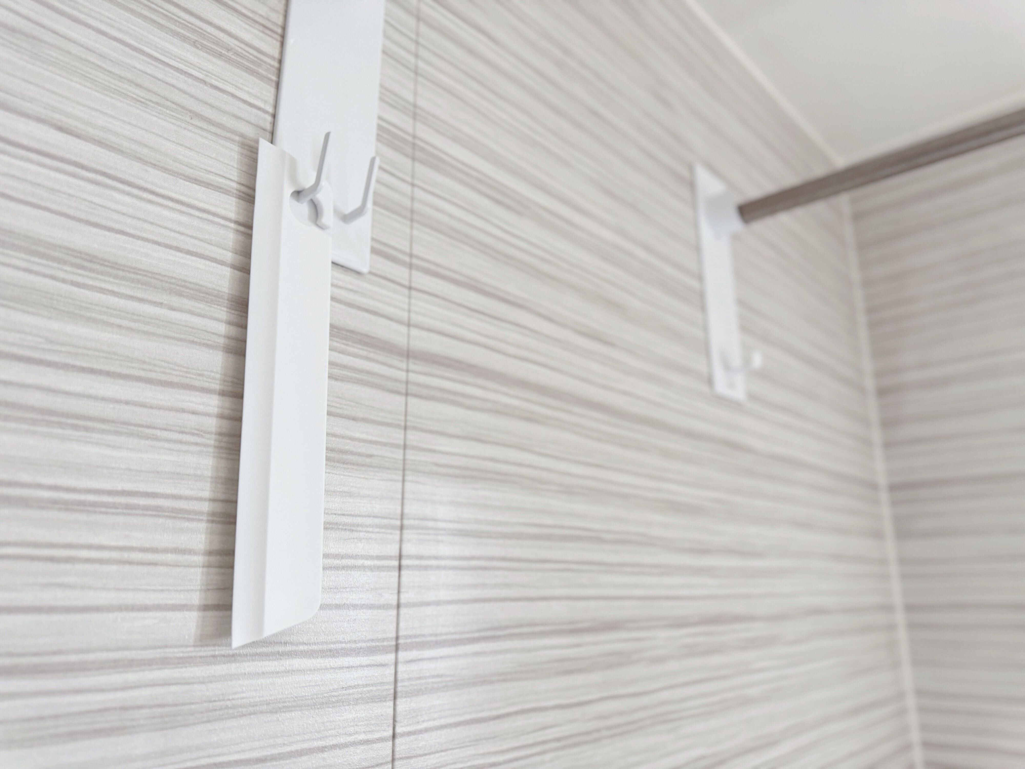 3．タオルバーにかけられるスクイージー