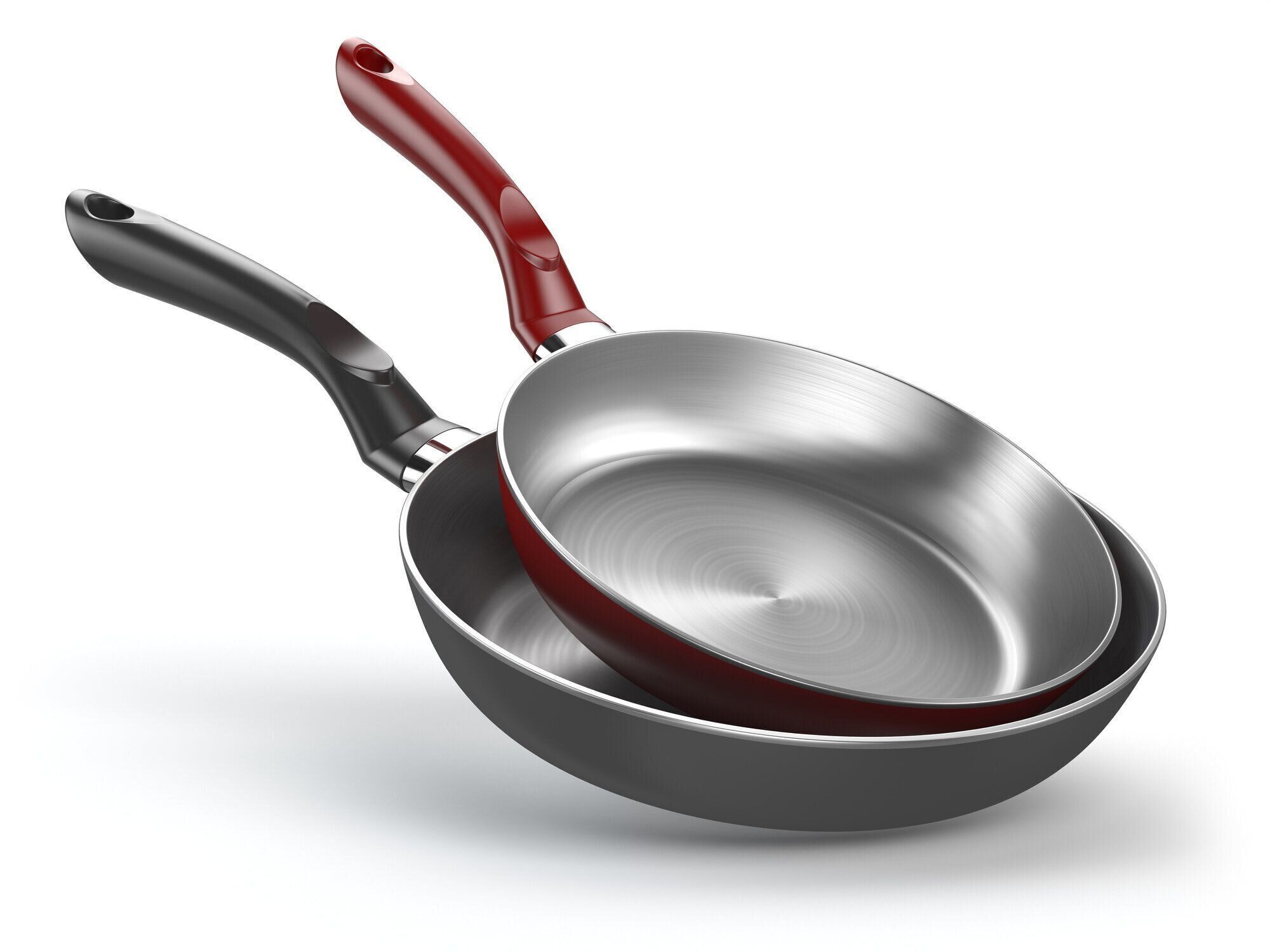 白い背景に分離された鋼のフライパン