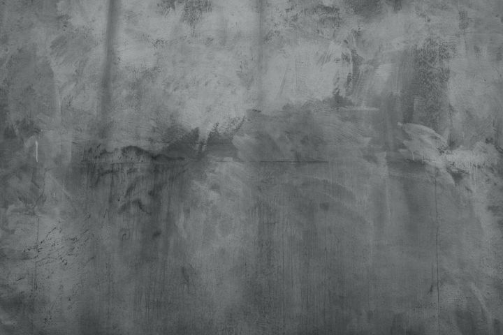 粗いグランジコンクリートの質感。グレーセメントモルタルの背景