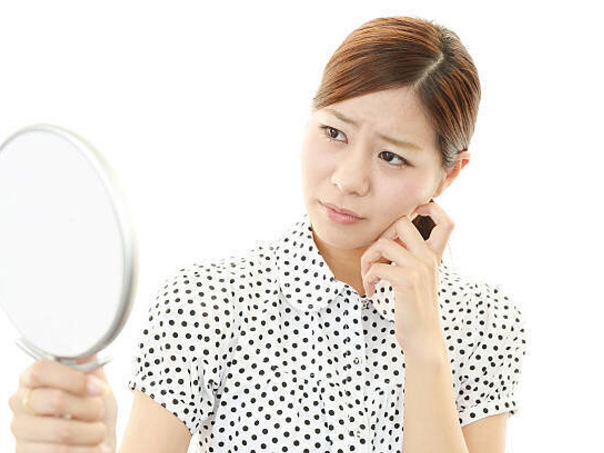 た若い女性のポートレートを押すお