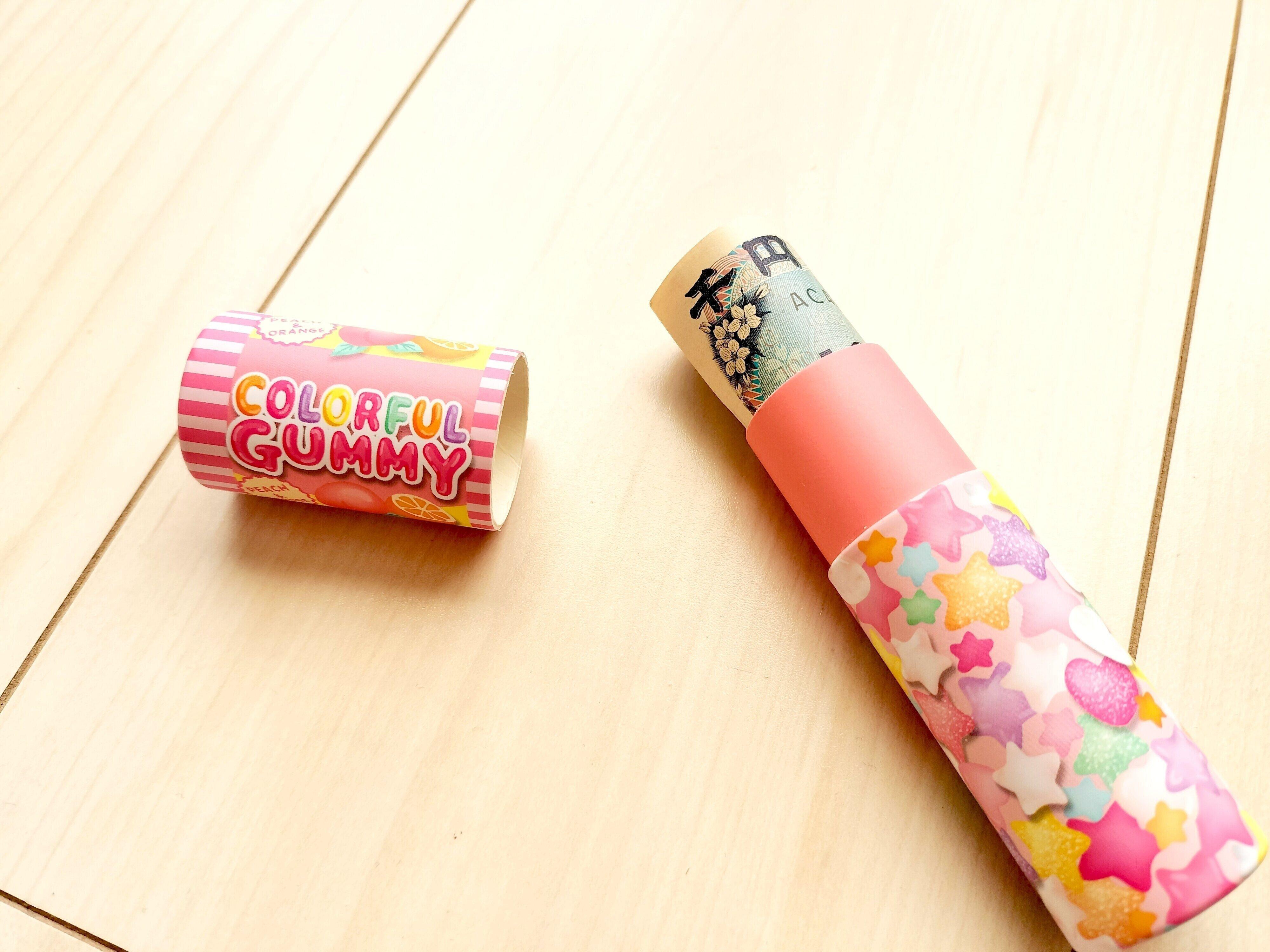 『ポチケースお菓子パッケージ』に千円札を入れたところ