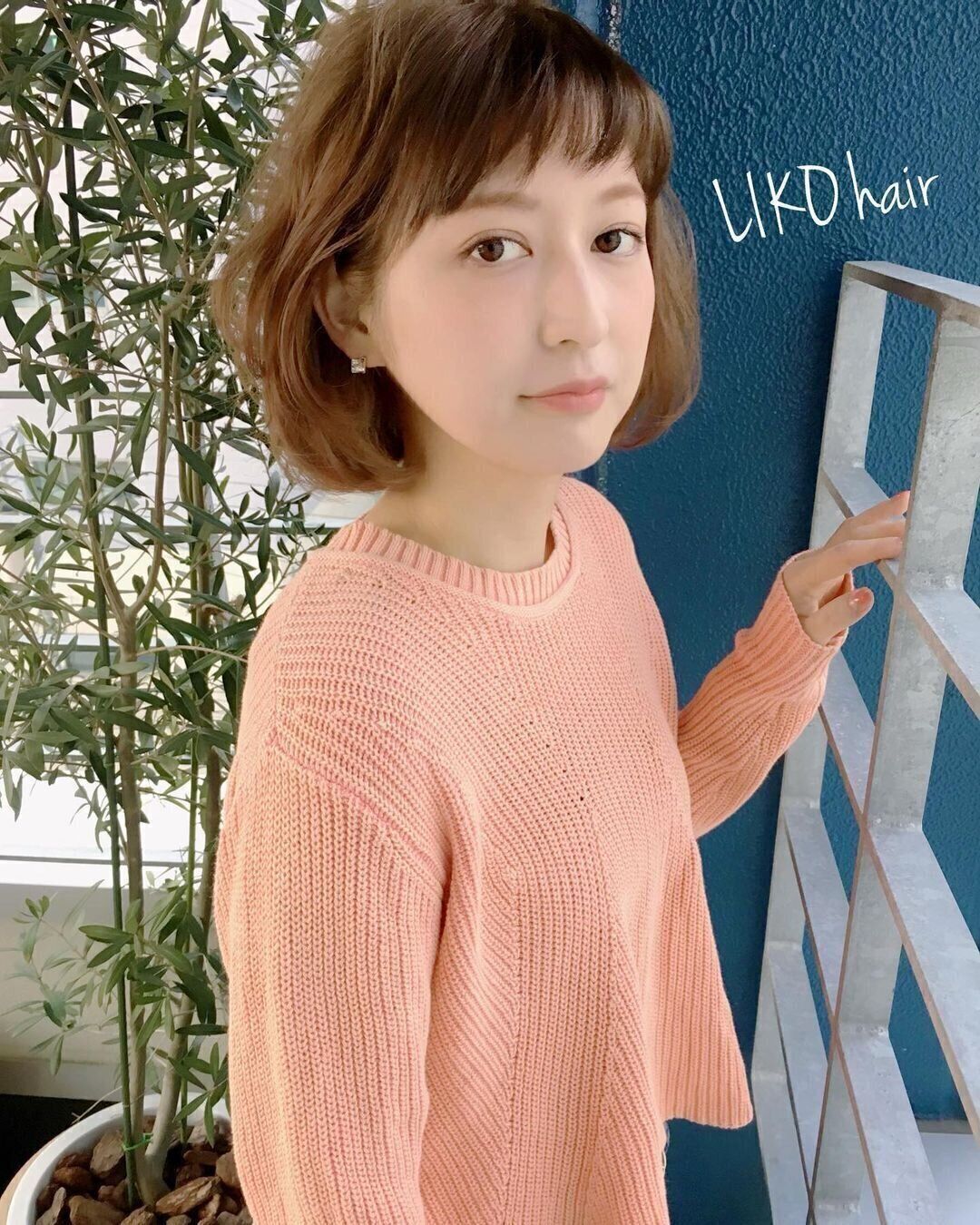 40代丸顔に似合うヘアスタイル オン眉バングでキュートな軽やかボブに