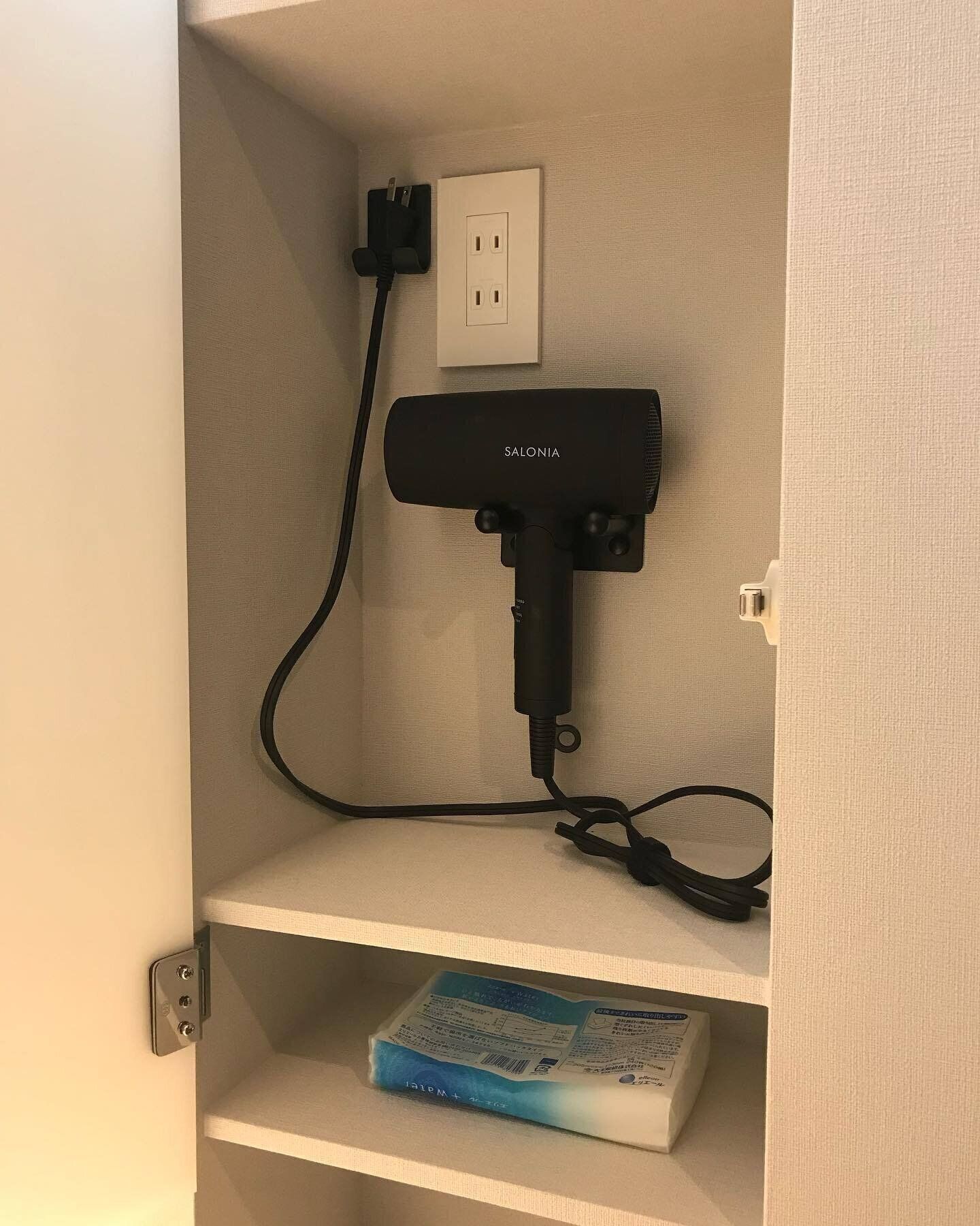 扉のなかに壁かけする収納方法