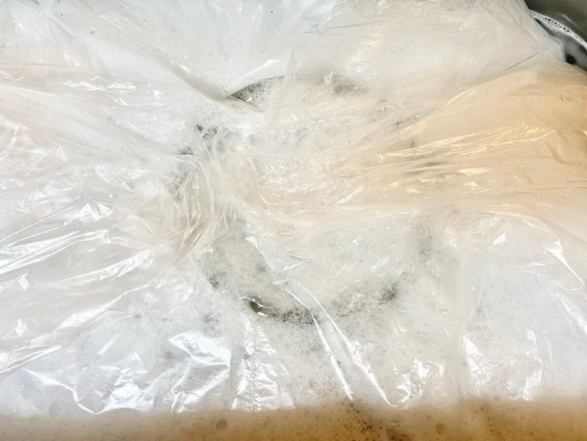 つけ置き袋の上部をシロッコファンに被せた状態