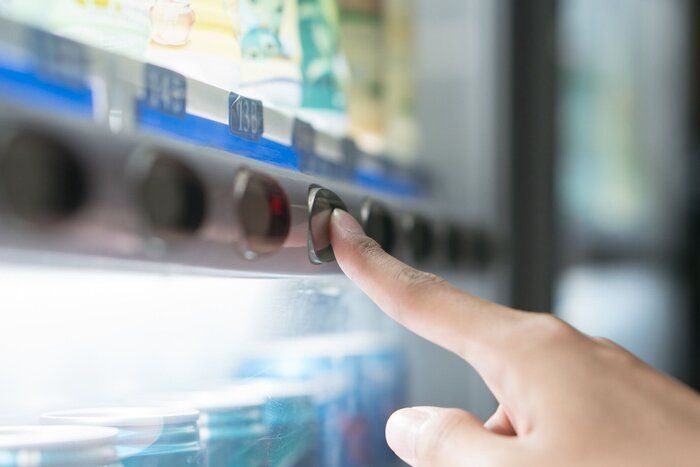 自動販売機の指プレスボタン