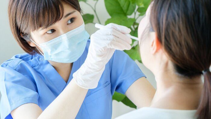 病院でのアジアの医師の健康診断
